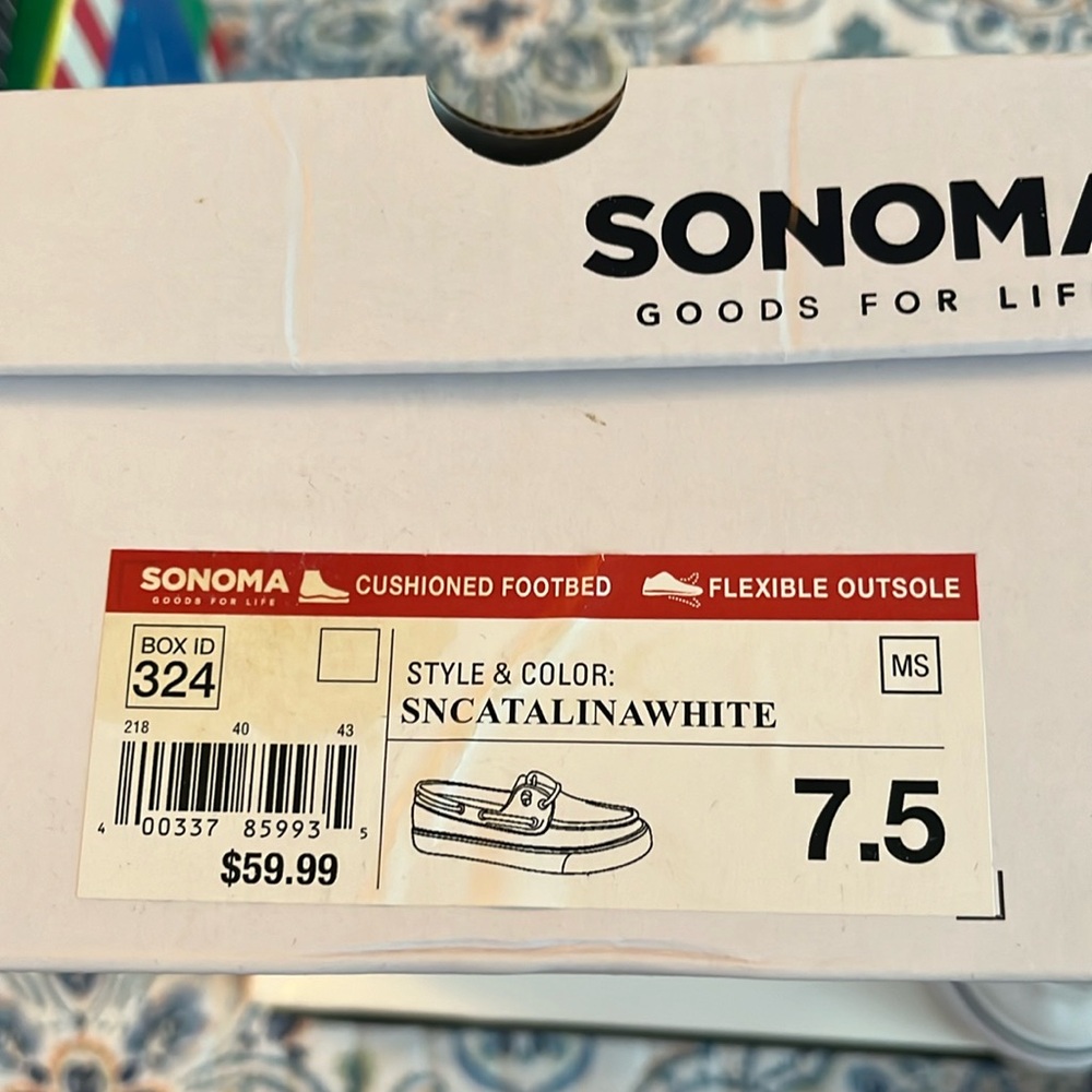 White boat shoes.  Hardly worn. Size 7-1/2